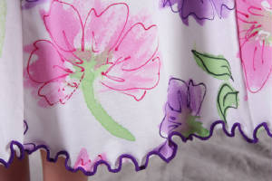 MeadowFloralsPinkPurpleDressBottomDetails.jpg